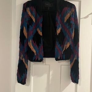 Leather and fringe jacket